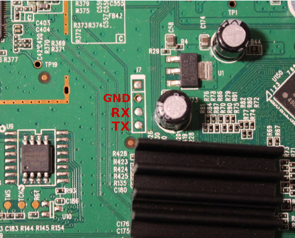 Conexiones RX, TX y GND del conector CP2102 para puerto serie en el TP Link TD-W8970 v1.2
